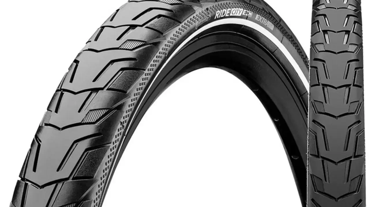 Opona rowerowa 700x45c "Ride City Extra" z agresywnym bieżnikiem, idealna na miejskie trasy.
