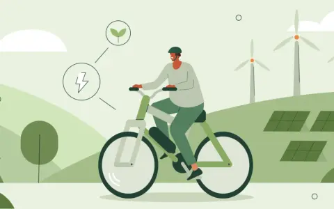 Mężczyzna na rowerze elektrycznym, symbolizującym ekologiczne podróże i duży zasięg. W tle farmy wiatrowe i panele słoneczne.