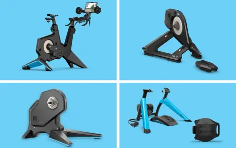 Różne modele trenażerów rowerowych, w tym Tacx Flux 2, pozwalają na trening w domu.