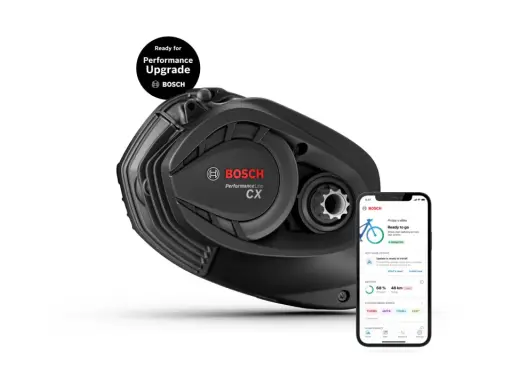 Silnik Bosch Performance CX Gen 5 do e-bike'a, gotowy na aktualizację. Obok smartfon z aplikacją Bosch eBike Flow.