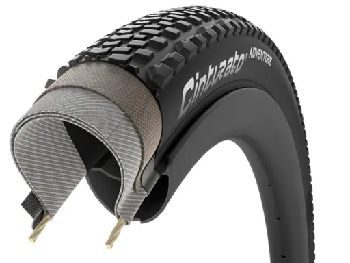 Przekrój opony rowerowej Pirelli Cinturato Adventure. Opona 700x40c jaki to rozmiar? Wytrzymała konstrukcja z wielowarstwowym karkasem.