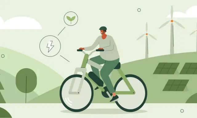 Mężczyzna na rowerze elektrycznym, symbolizującym ekologiczne podróże i duży zasięg. W tle farmy wiatrowe i panele słoneczne.