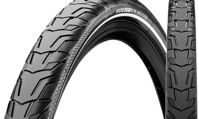 Opona rowerowa 700x45c "Ride City Extra" z agresywnym bieżnikiem, idealna na miejskie trasy.